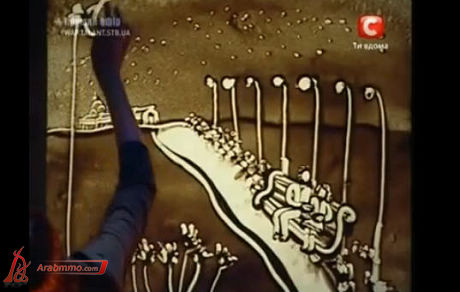 الرسم بالرمل على الزجاج